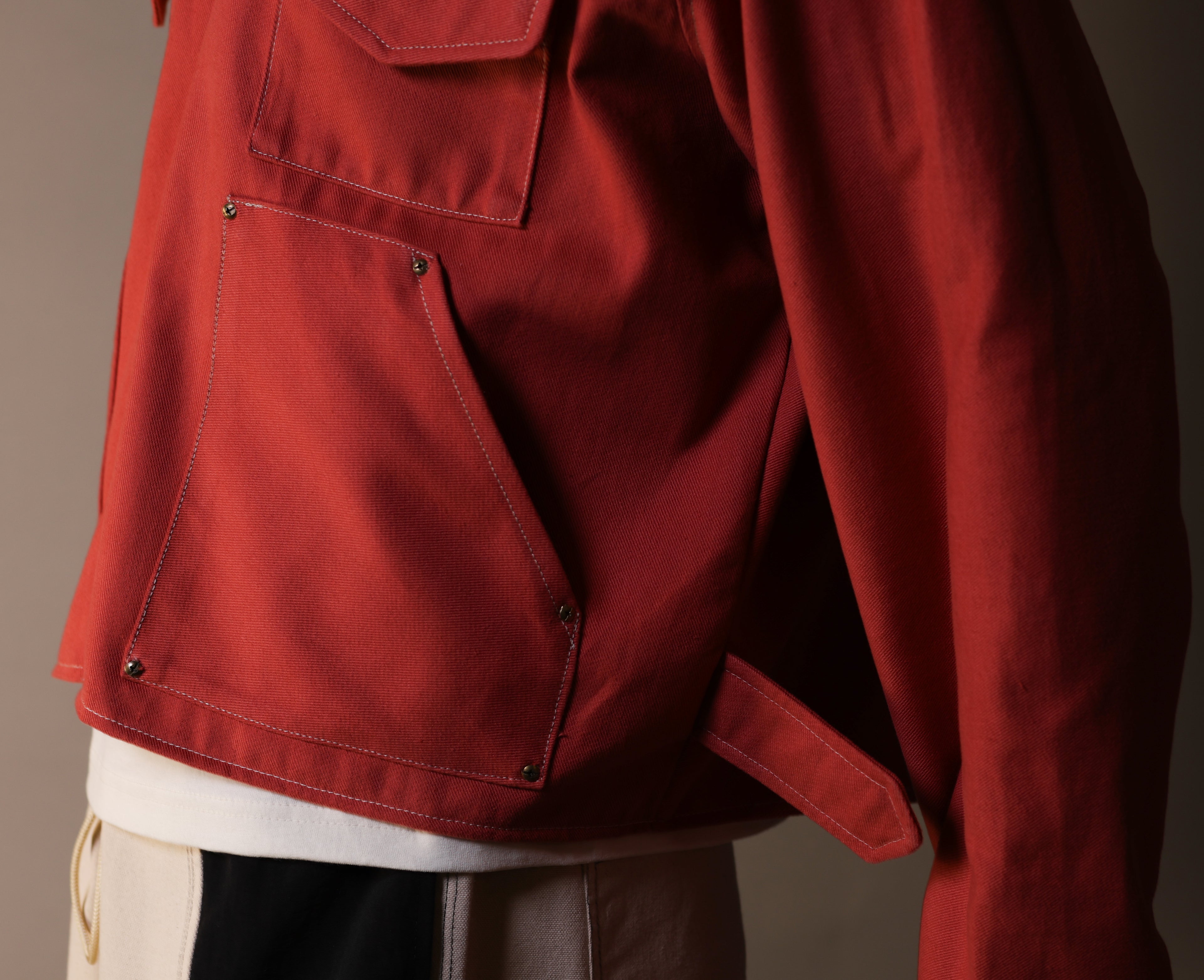 Red jacket with a neutral background