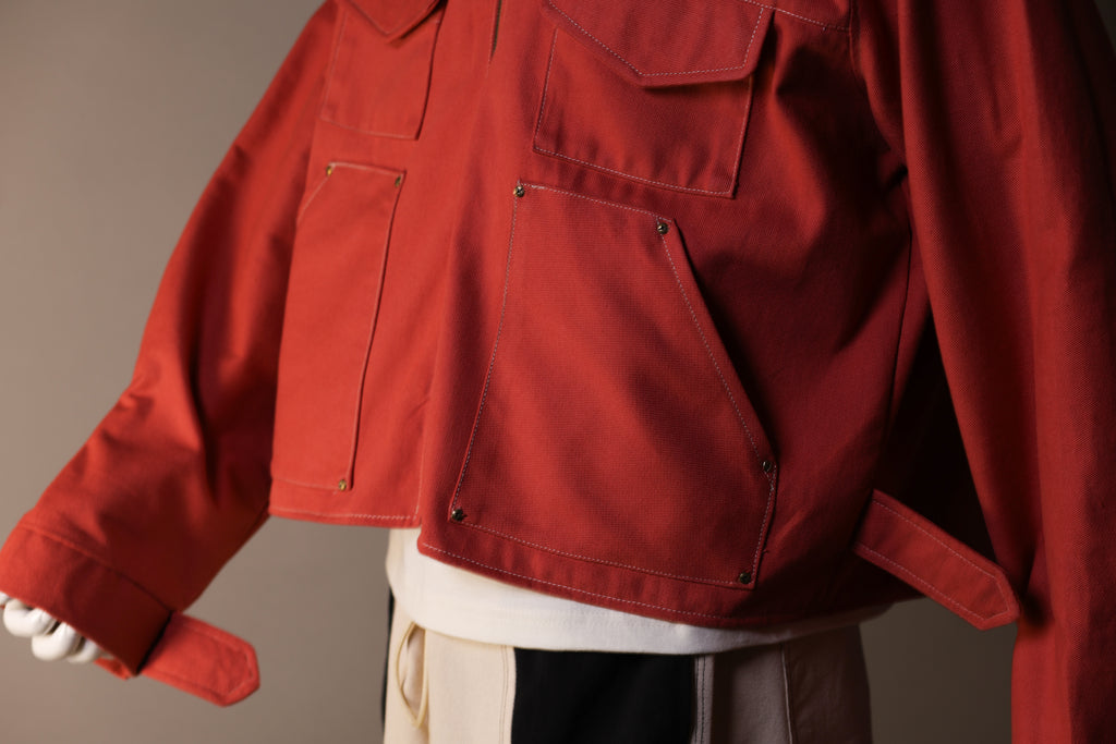 Red jacket with a neutral background